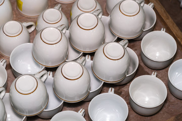 Many white coffee cups
