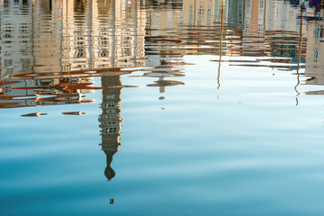 Water reflection of Piran town at the sunrise in Slovenia