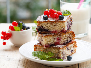 Summer dessert. Homemade pie with blueberries and currants
