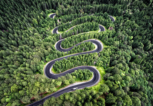 Curvy road from the high mountain pass in Transalpina, Romania.
