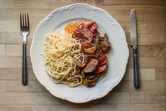Beef with sphagetti.