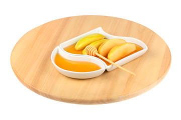 Dipping apples in honey