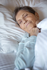 Senior woman sleeping.