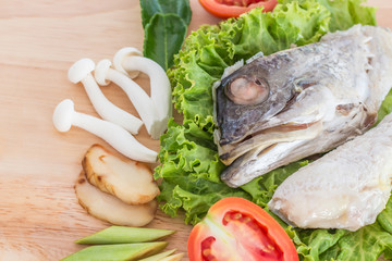 Thai food Ingredient of Tom Yum spicy Fish soup on wooden textur