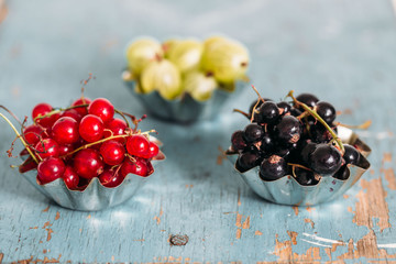 tasty summer berries on a wooden table. Fresh concept, fruits background