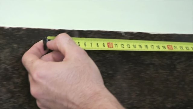 Length measurement wall tiles. Close up