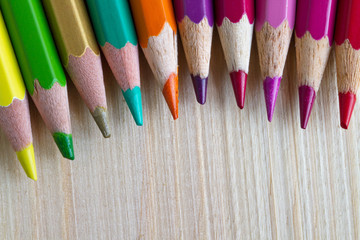 coloured pencil on the wood floor.