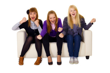 Fototapeta premium Jubilant young woman on sofa