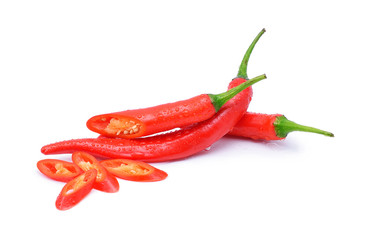 Red chili pepper with water drops on white background.