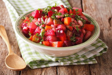 Homemade Russian vegetable salad close up. horizontal

