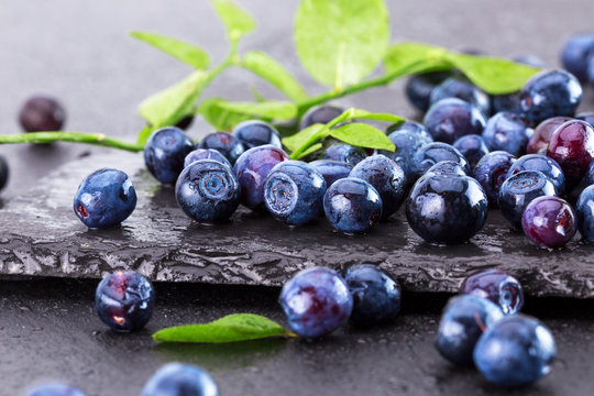 blueberries on a slate table