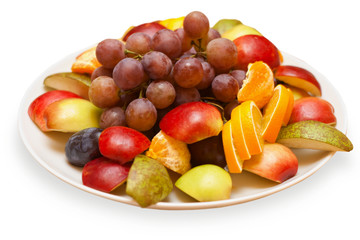 Fruits on a plate isolated on white background