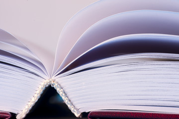 Open book on light table. Back to school. Copy space