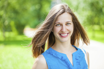 Fototapeta premium Portrait of beautiful young happy woman