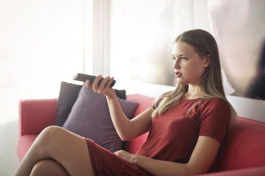 Woman using a remote control