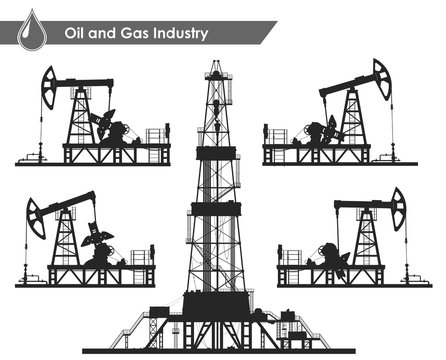 Set of oil pumps and rig silhouettes
