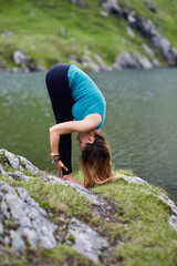 Young woman practicing yoga outdoor