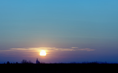 Sunset over the old Christian Church