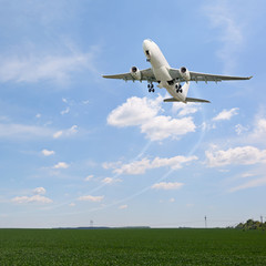 Fototapeta na wymiar Passenger aircraft taking off