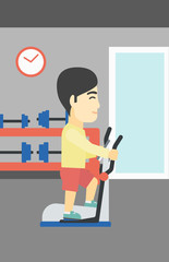 Man exercising on elliptical trainer.