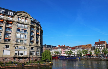 Fototapeta na wymiar Beautiful building along the river in Strasbourg - France
