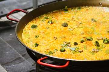 Cooking of a raditional spanish dish paella