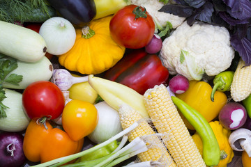 Background of fresh vegetables and greens closeup