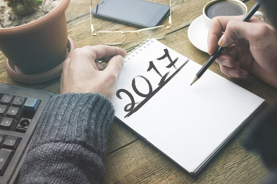 man writing 2017 - Powered by Adobe