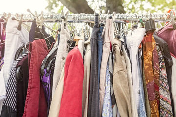 clothes on a rack on a flea market