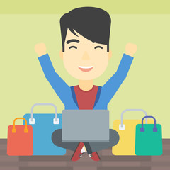 Man shopping online using his laptop.