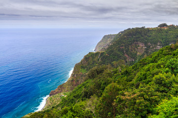 Fototapeta na wymiar Amazing view of mountains and ocean on the northern coast of Madeira near Boaventura, Portugal