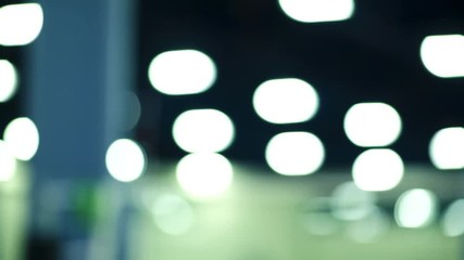 Cool close-up shot of unrecognizable female serving ball during volleyball game