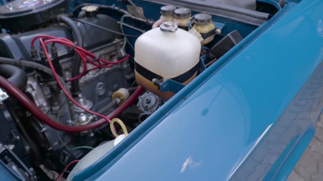 The open engine part of the old LADA Vaz car featuring the old engines of the old car