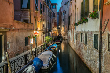 Evening along canal in Venice, Italy