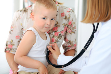 Doctor examining a child  patient by stethoscope