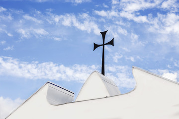 Metal cross on the church's gates