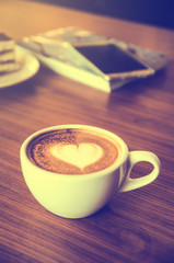 cup of coffee on table in cafe