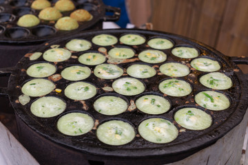 Thai traditional sweet takoyaki named mortar toasted pastry, tha