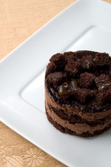 Chocolate Cake in a White Plate