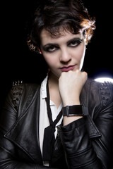 Fashionable depiction of wearable tech smart watch on a punk rock female model