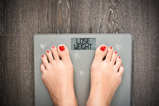 Diet Problems Concept With Weight Scale Broken Glass