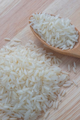 Jasmine rice and wooden spoon