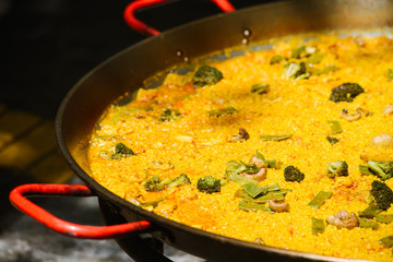 Cooking of a raditional spanish dish paella