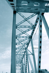 Railway metal bridge perspective view. Monochrome image