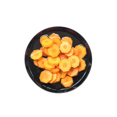 Closeup fresh pile of carrot in water on black plastic bowl isolated on white background , prepare for cook concept