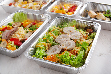 Healthy food in boxes, diet concept.