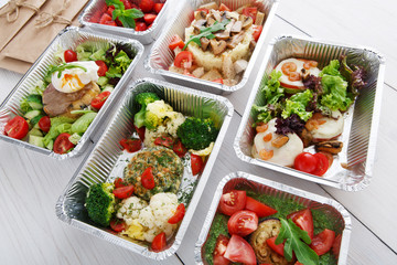 Healthy food in boxes, diet concept.