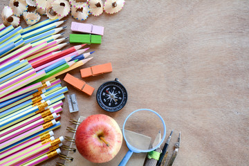 Top view set school supplies on a wooden table with copy space. Back to school
