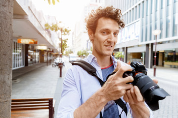 Male photographer taking picture