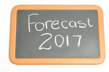 A black board with the words Forecast 2017